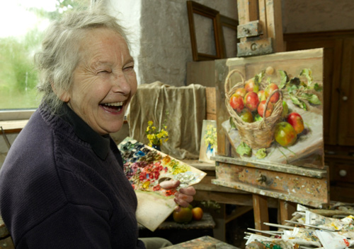 Anne Cotterill painting in her studio.